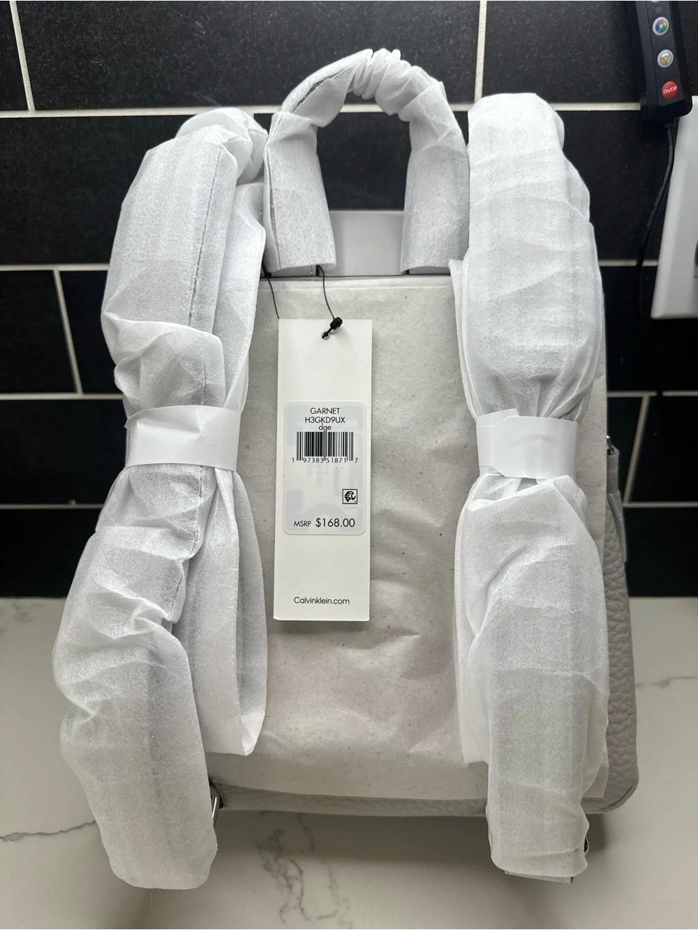 Calvin Klein Light Gray Pebbled Leather Mini Backpack